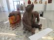 sculpture en terre cuite patinée
un ours assis